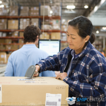 man and woman working in a warehouse