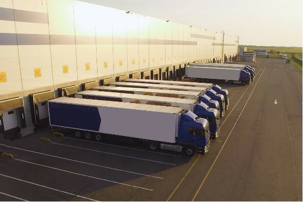 Trucks being loaded with shipments for customers 